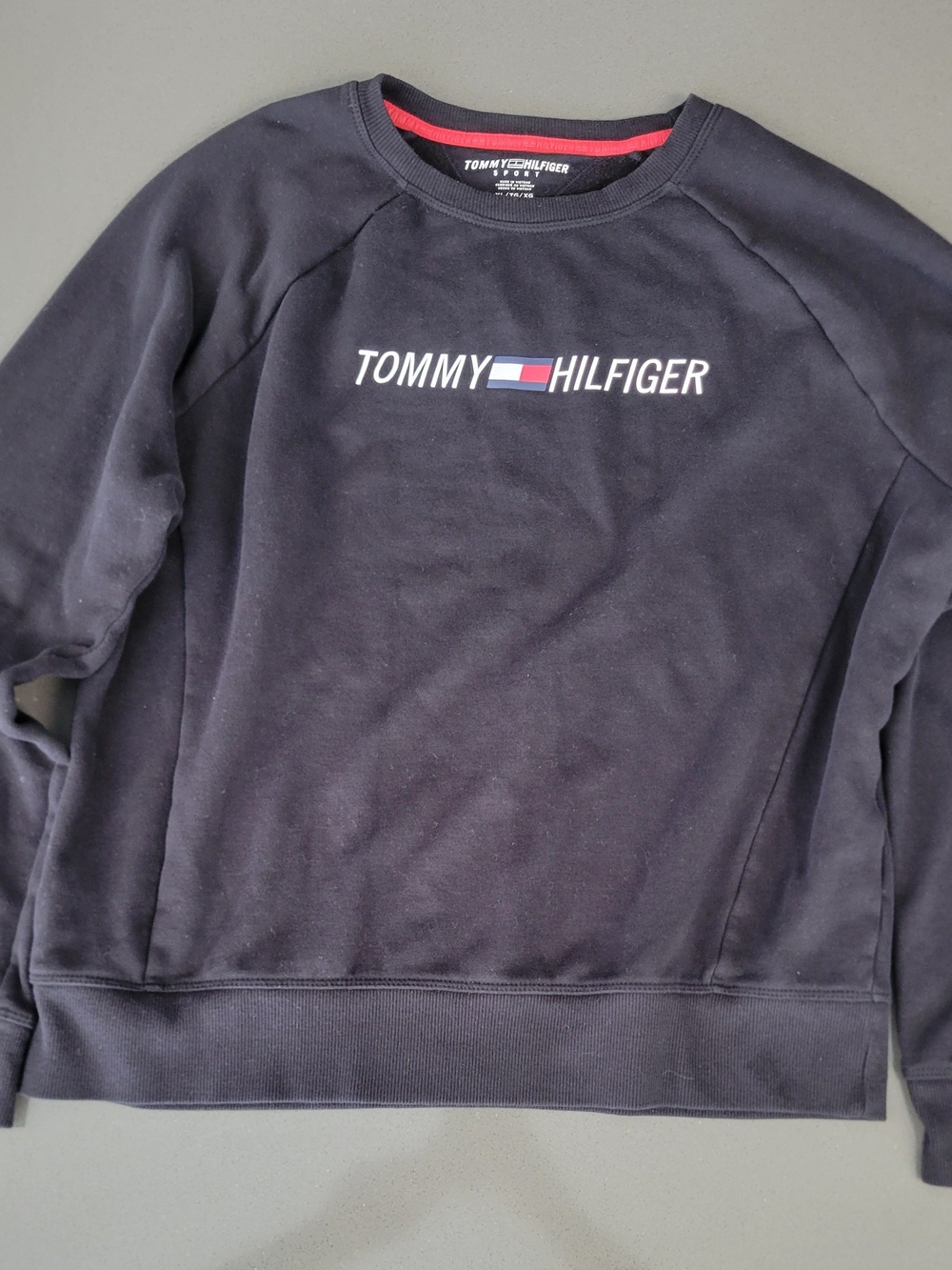 Elevate your casual wardrobe with this classic Tommy Hilfiger Sport Crewneck Swe